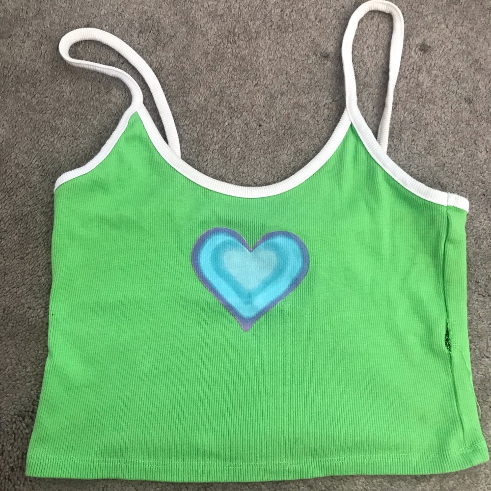 Crop top. Medium but fits small . There is a slight tear. U can sew it back